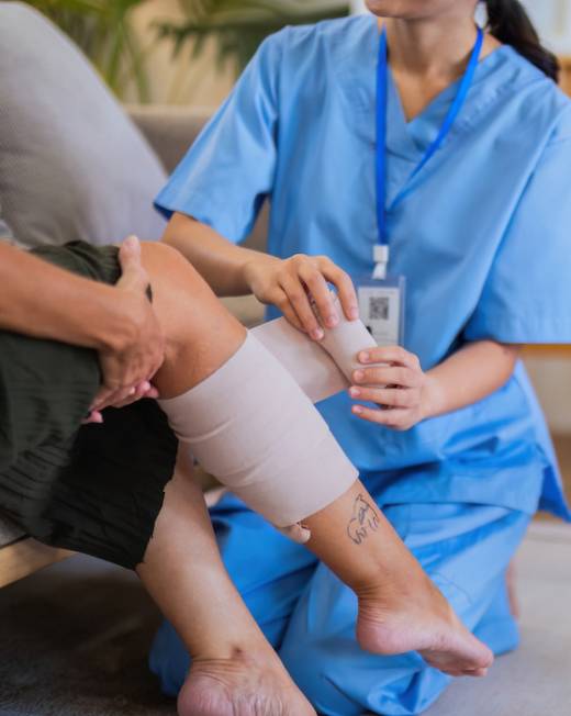 Physical therapist caregiver Asian and Caucasian senior women trust moving hand in rehabilitation. Physiotherapy healthcare, Medical caregiver consulting disabled elderly patient at home Physical therapist caregiver Asian and Caucasian senior women trust moving hand in rehabilitation. Physiotherapy healthcare, Medical caregiver consulting disabled elderly patient at home.